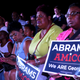 People looking on as Stacey Abrams speaks at a campaign stop at Savannah State University on Tuesday, October 16, 2018,